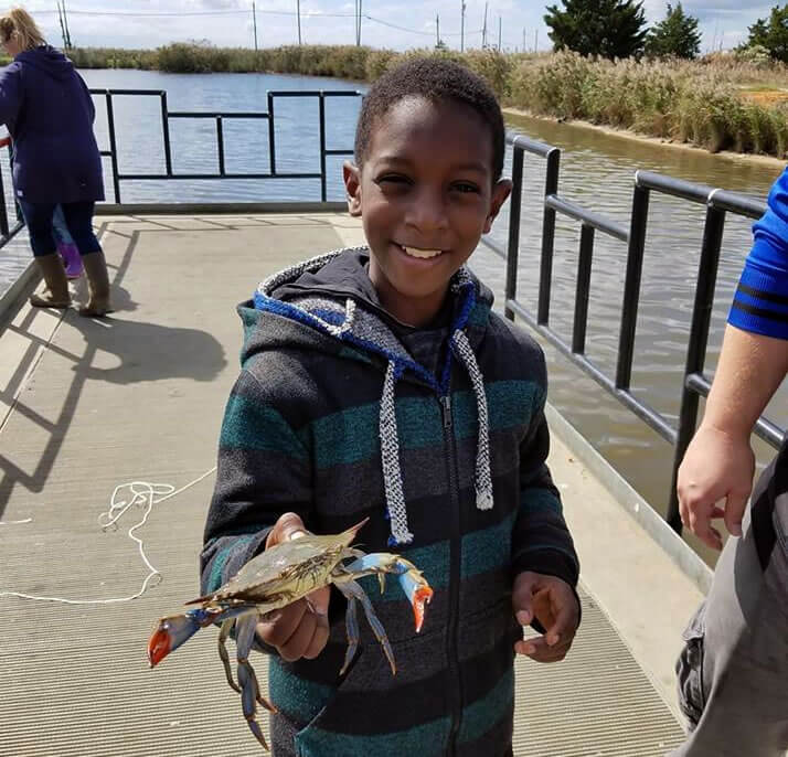 Youth with crab
