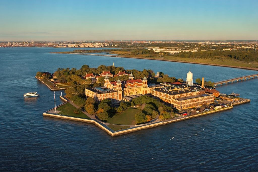 Ellis Island sits in New York Harbor and is considered part of New York and New Jersey.