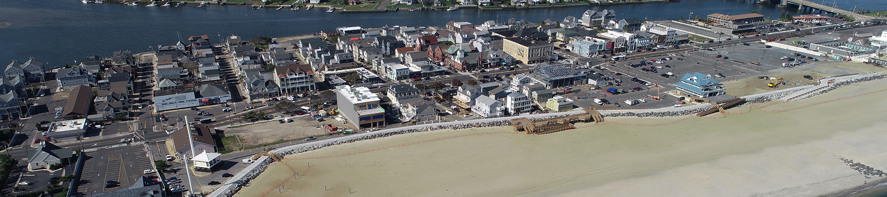 Recently completed stone seawall, walkway, pedestrian access structures, and vehicular crossover ramp